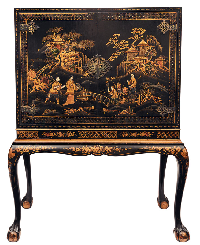 A lacquered cabinet with chinese garden scenes