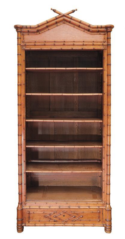 A bookshelf with bamboo decoration