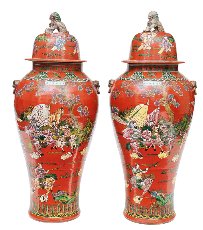 A pair of impressive red underground vases with equestrian scenes