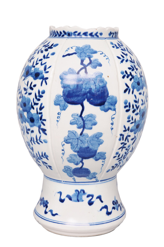 An unusual pomegranate vase with fruits and flower decoration