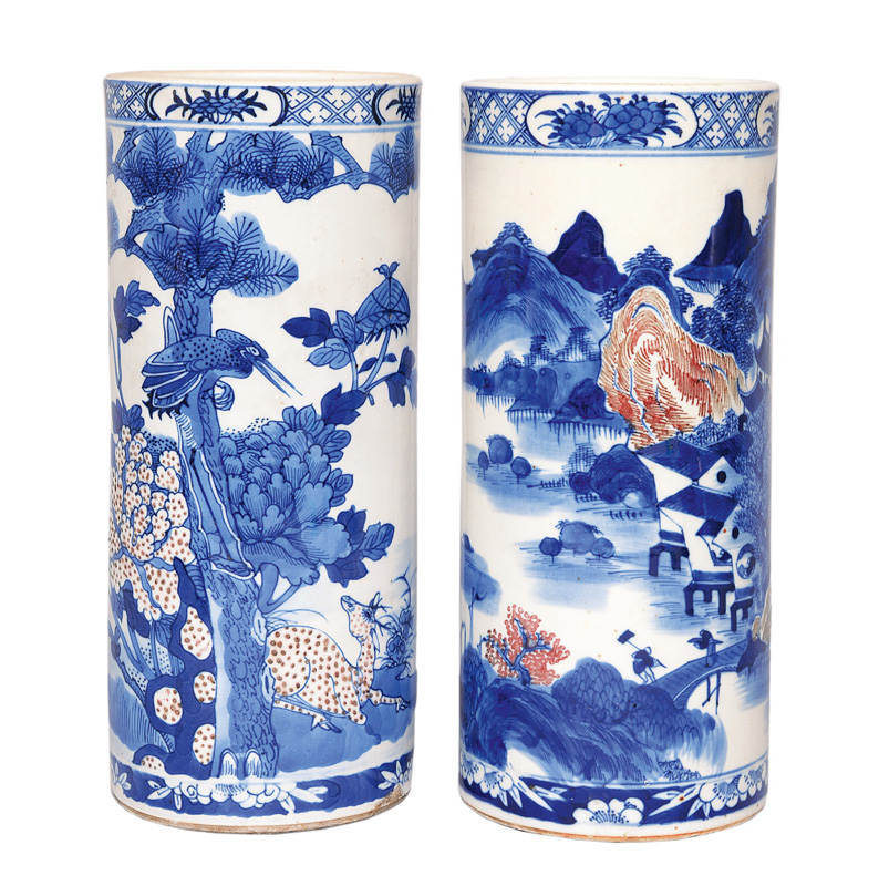 A pair of cylindrical vases