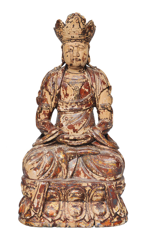 A wood figurine "Guanyin on a lotus base"