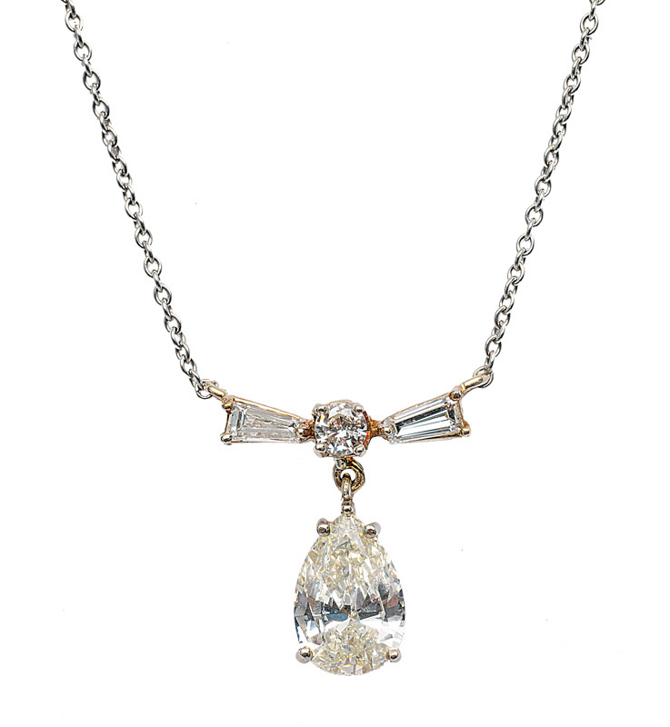 A diamond pendant with necklace