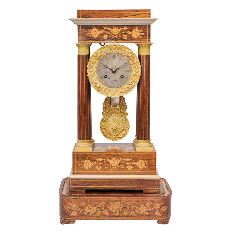 A mantle clock with floral marquetry