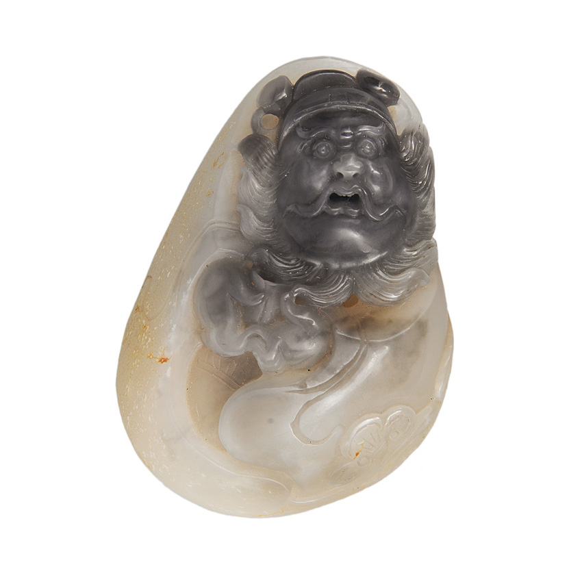 A jade handstone with Taoist deity