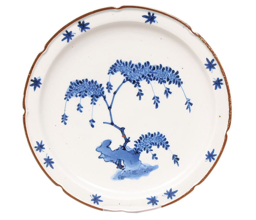 A fine Arita plate with "Rock and Tree"