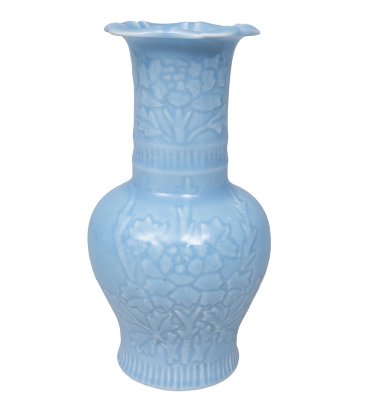 A monochrome baluster vase with peony relief