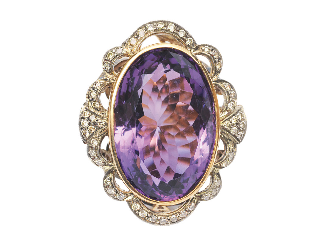 A splendid amethyst diamond ring