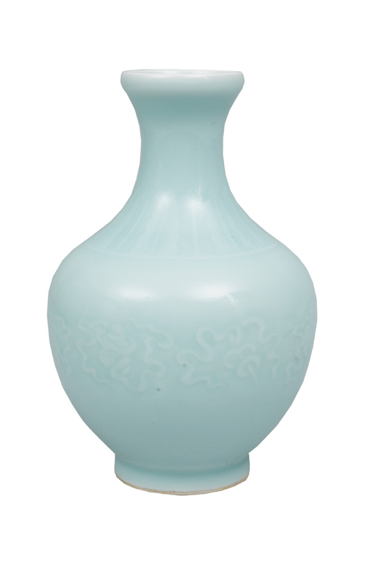 A celadon vase with fine relief decoration