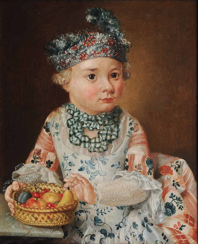 Portrait eines Kindes mit Obstkorb