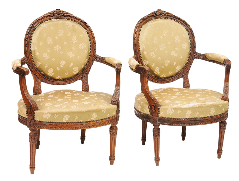 A pair of carved Louis Seize fauteuils