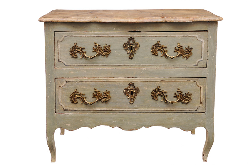 A coloured Louis Quinze chest of drawers