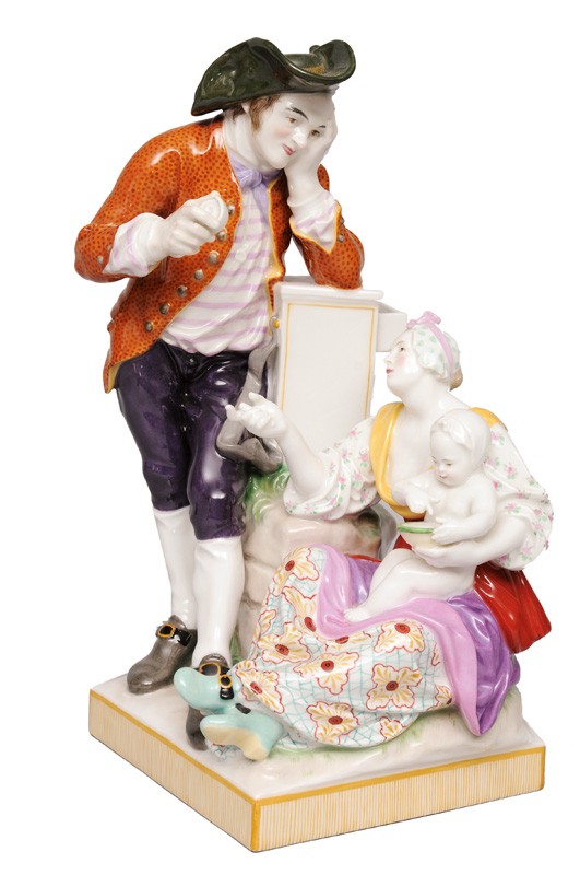 A figurine group "The Grocer Family"