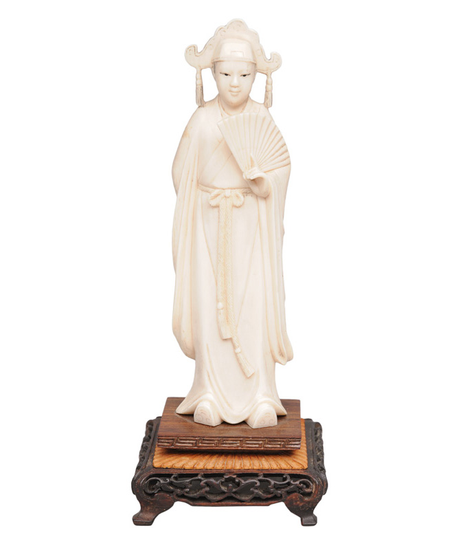 An ivory figure "Official with fan"