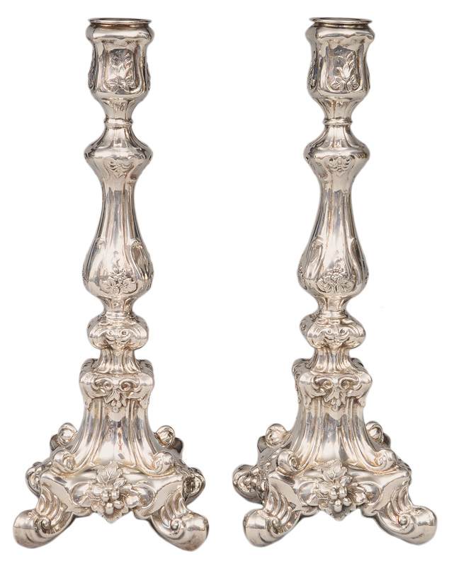 A pair of large candlesticks in the style of Baroque