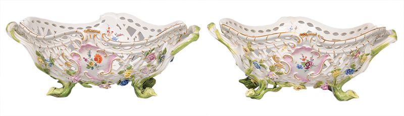 A pair of fretwork baskets with flower decoration