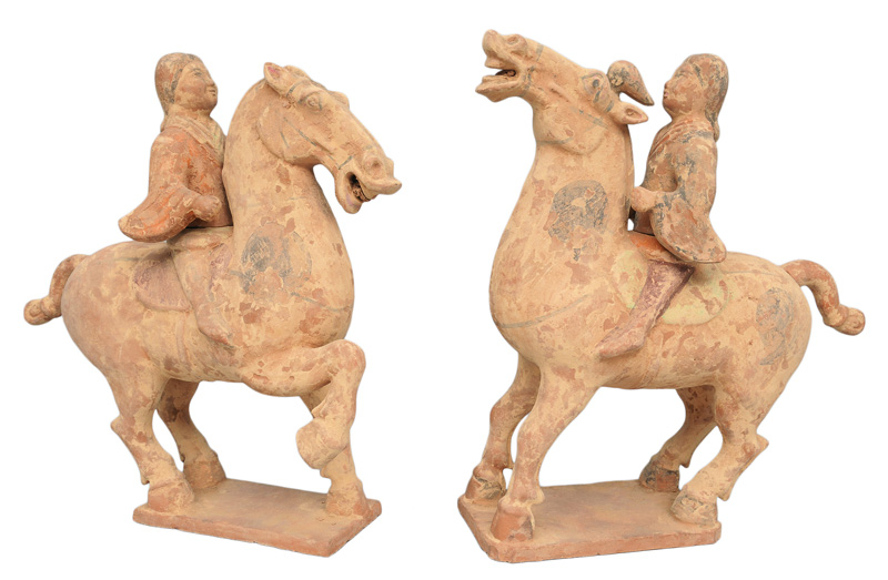 A pair of pottery figures "Female polo players on horses"