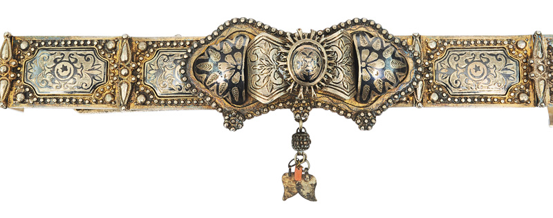 A silver belt with niello ornament