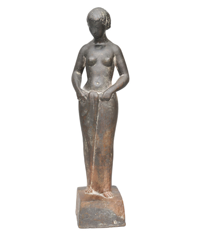 A bronze figure "Sich bindende"