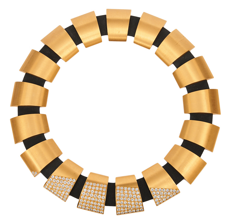 A modern gold necklace with diamonds