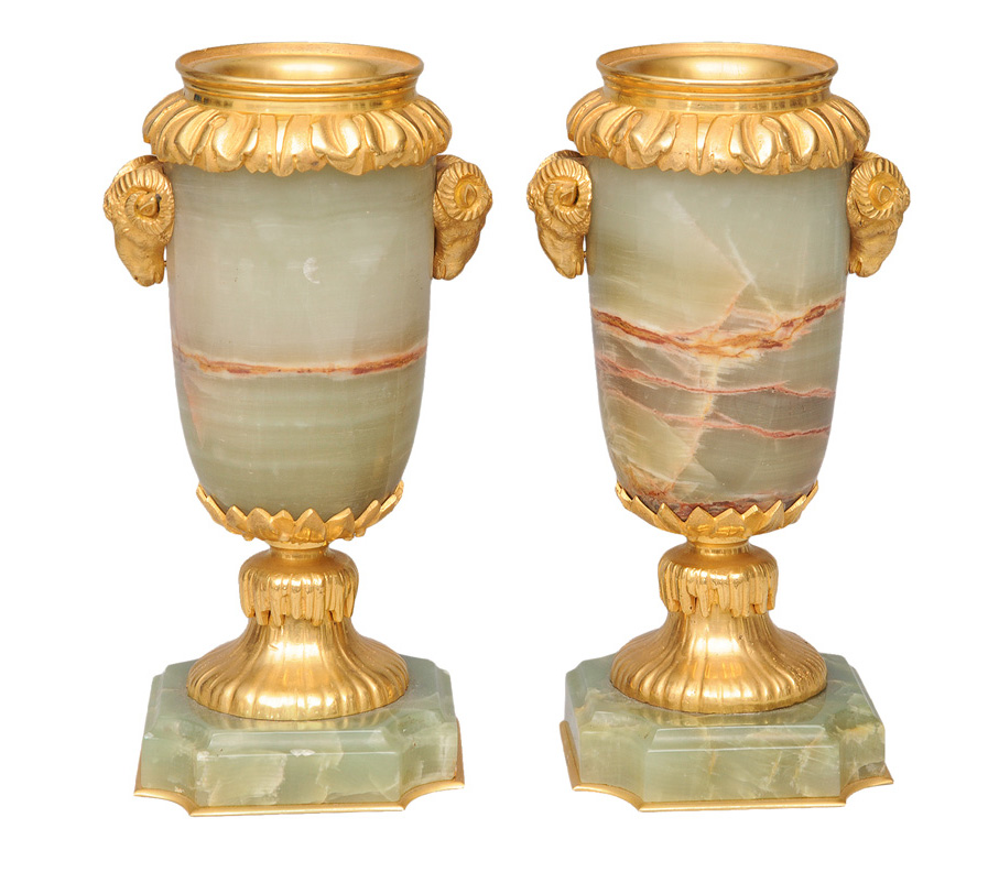 A pair of decorative bronze and onyx vases