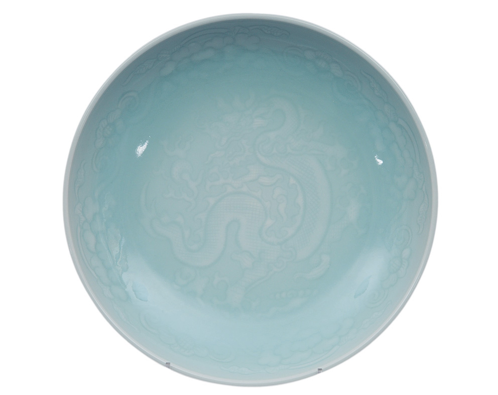 A fine celadon plate with dragon decoration