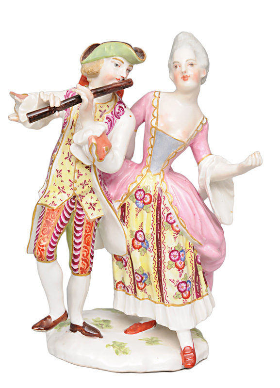 A figurine group "Couple making music"