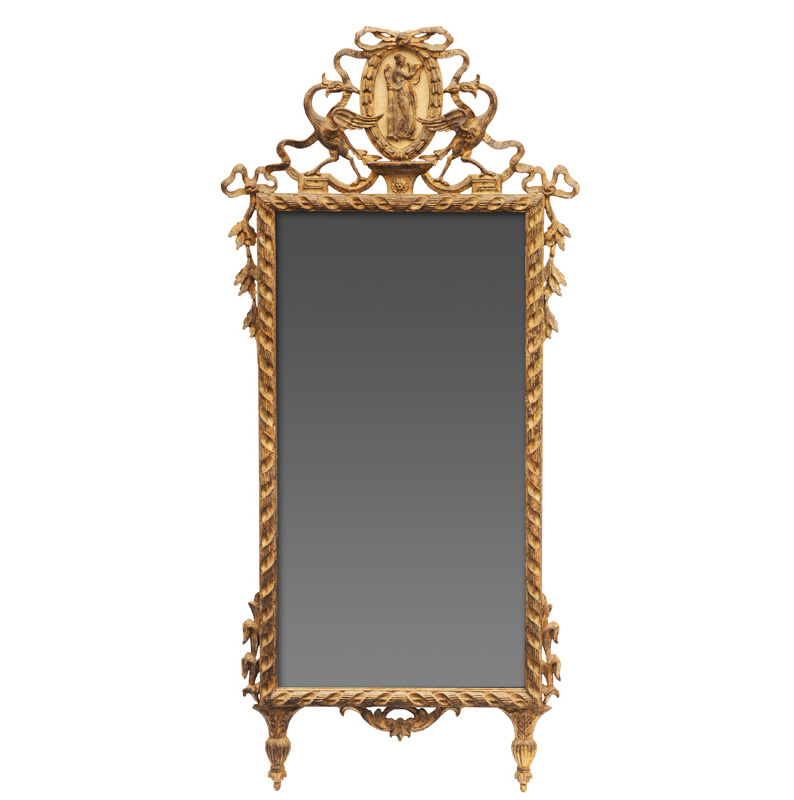 A mirror in the style of Louis Seize
