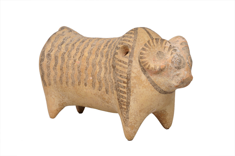 A pre-historic ceramic figure of an ox