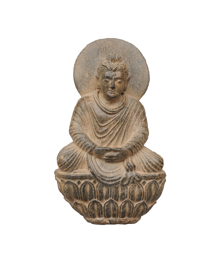 A grey chist figure of a Gandhara-Buddha on a lotus throne