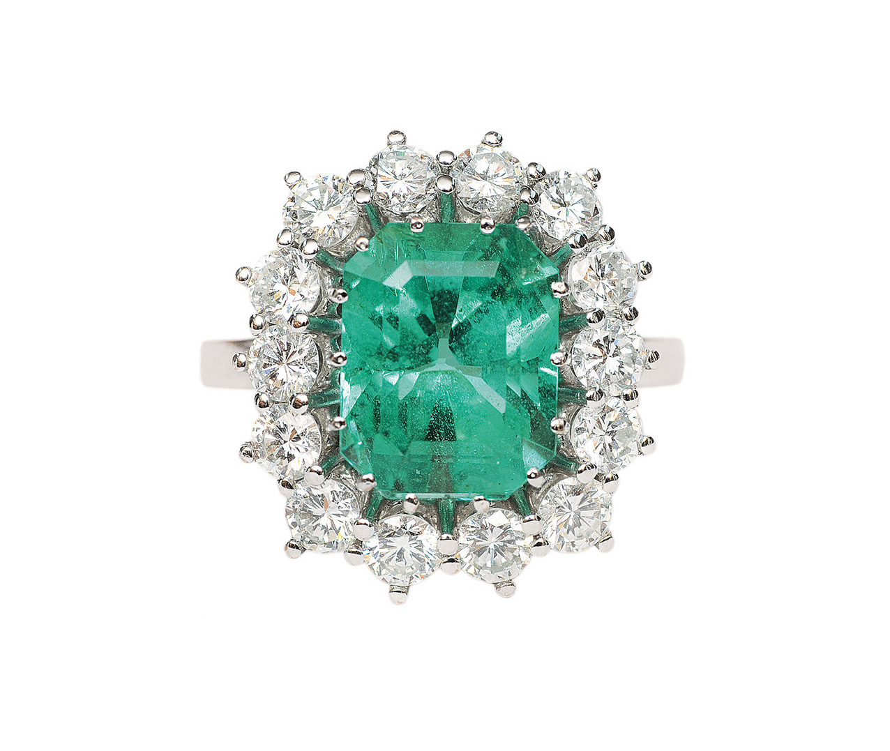 An emerald diamond ring