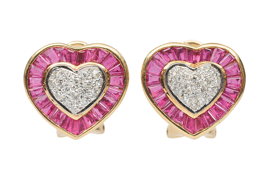 A pair of heartshaped ruby diamond earclips
