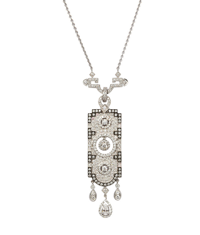 A diamond pendant with necklace in the style