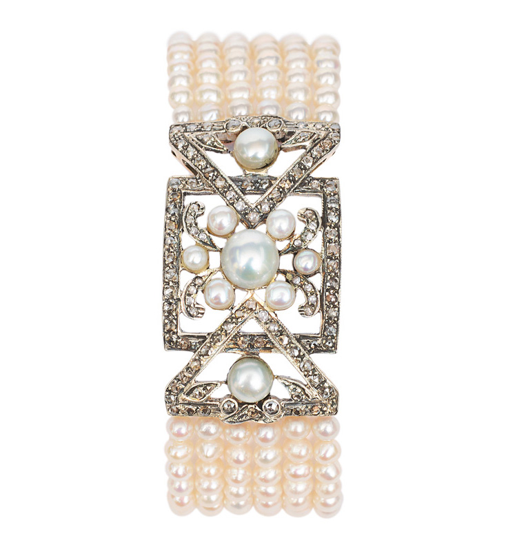 A pearl bracelet with diamonds