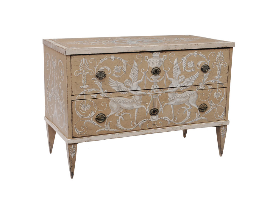 A coloured chest of drawers with antique-like painting