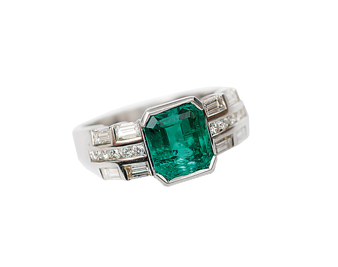 A fine emerald diamond ring