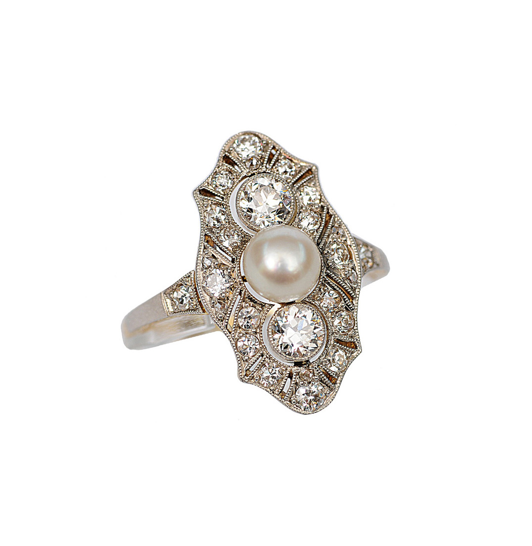 An Art-Nouveau pearl diamond ring