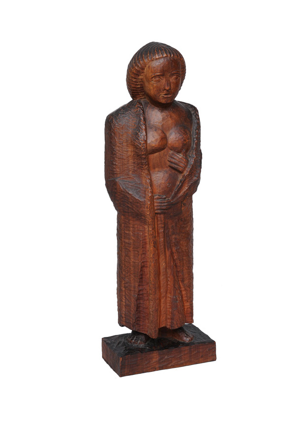 An expressive wood sculpture "Female Nude with overcoat"