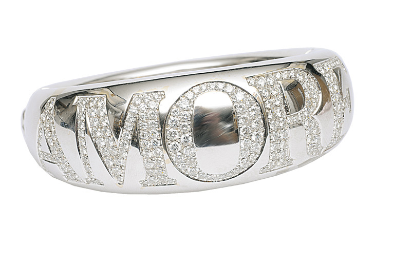 A highcarat, modern gold bangle bracelet with diamonds "Amore" by Bruni Bossio