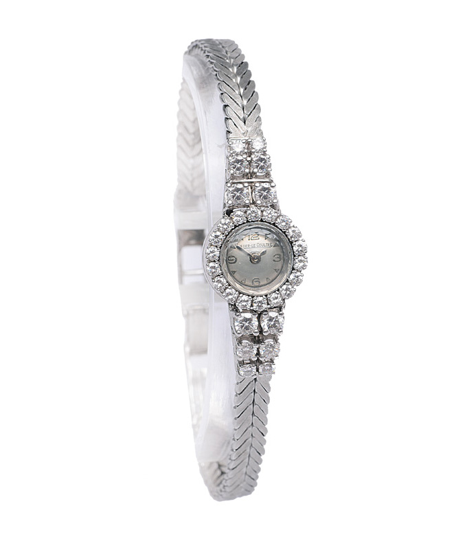 A petite ladie"s watch with diamonds