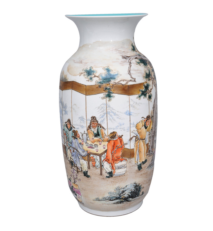 A tall rouleau vase with dinner scene