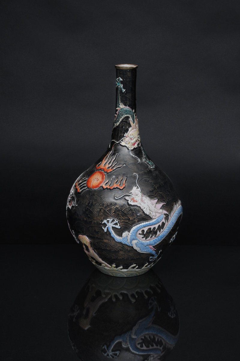 An unusual "Famille-Noire" bottle vase with dragon relief - image 2