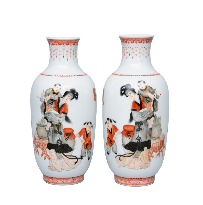 A pair of fine rouleau vases with genre scene
