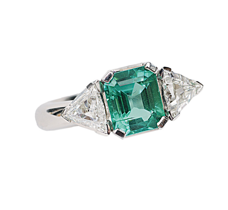 A fine emerald diamond ring