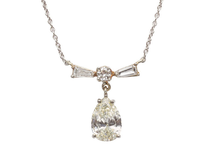 A diamond pendant with necklace A diamond pendant with necklace