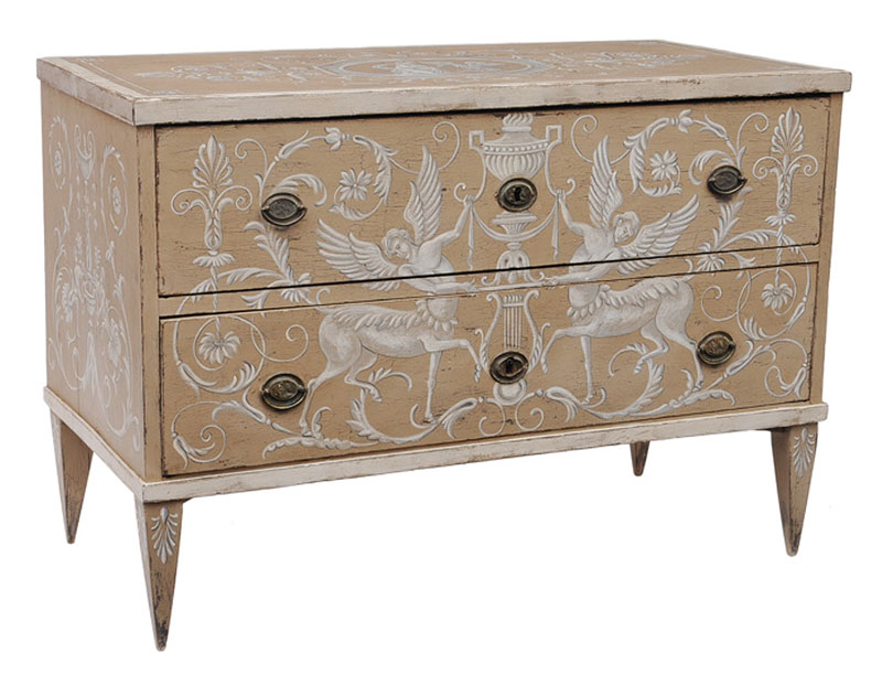 A coloured chest of drawers with antique-like painting