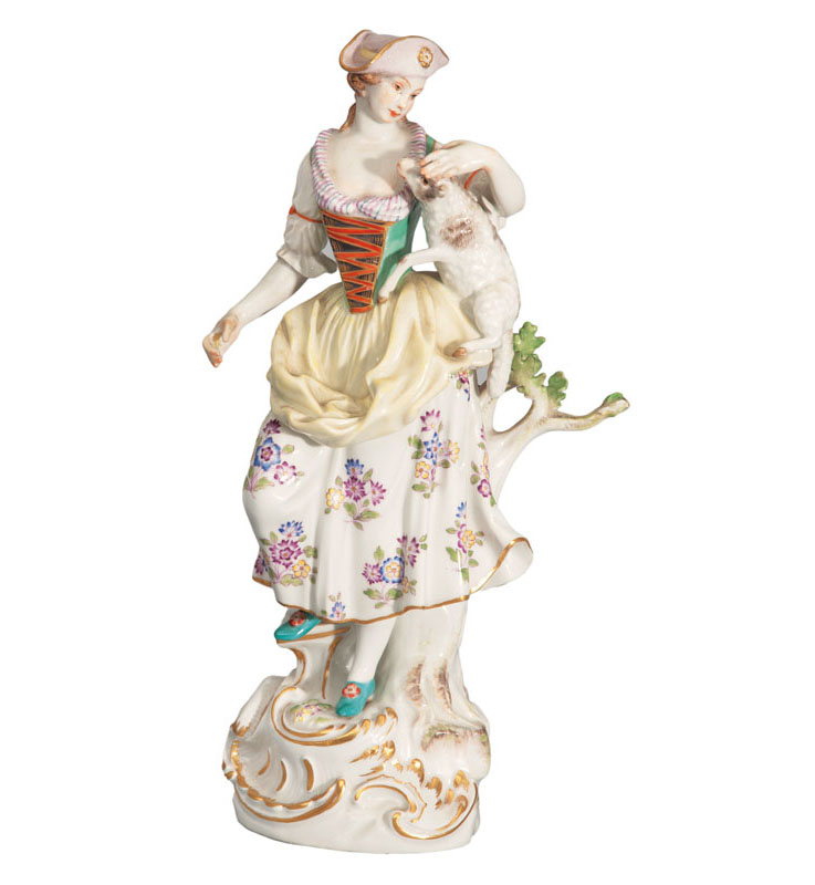 A tall figure 'Shepherdess with lamb'