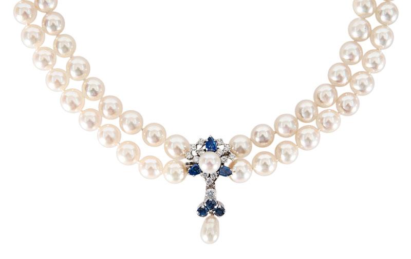 A pearl necklace with sapphire-diamond clasp