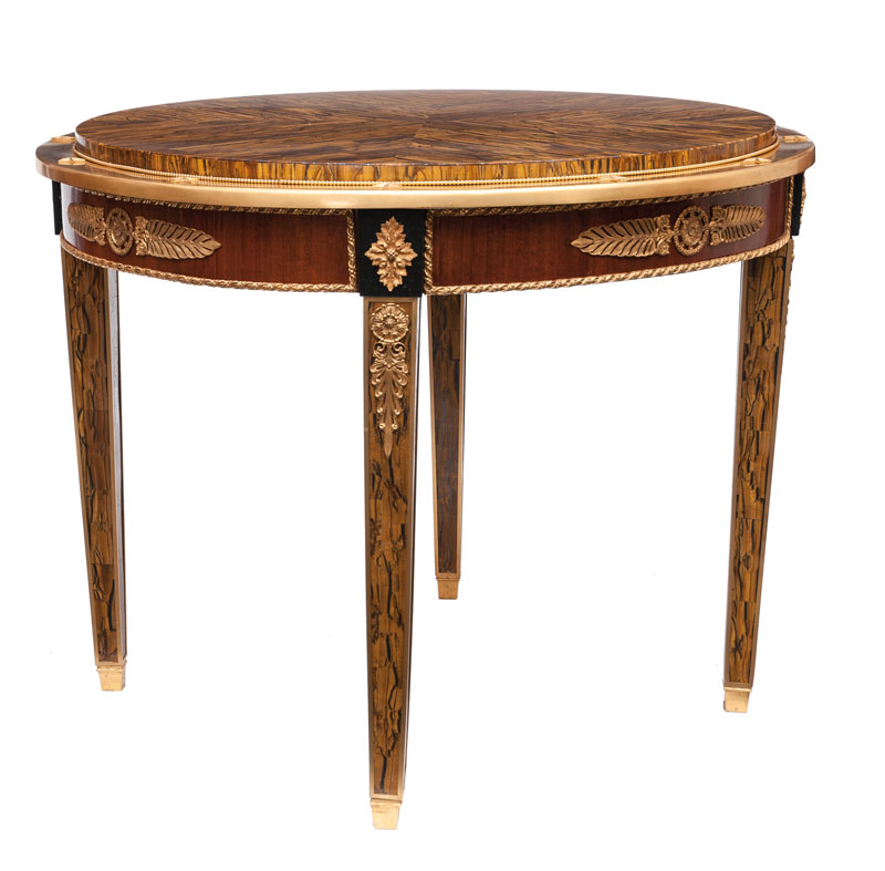 An extraordinary table in the style of Empire and with rare tiger's eye veneer