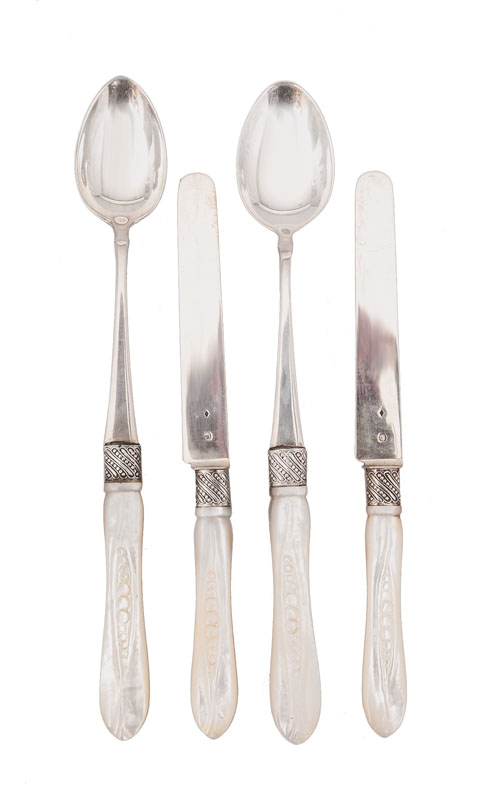 A set of 6 spoons and 6 knives with nacreous handle